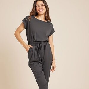 Japna Olive Green Short Sleeve Peep hole back jumper size Lg - Like New